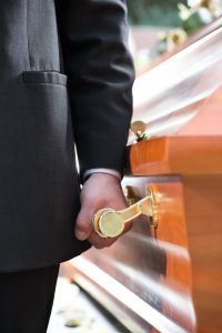 casket carried at funeral