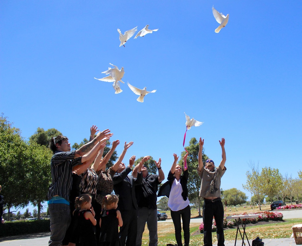 releasing doves at funeral
