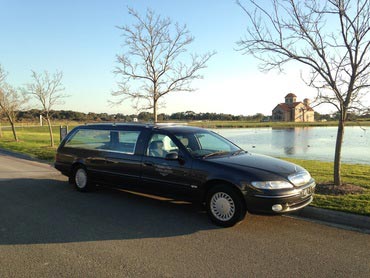 hearse at cemetary lake